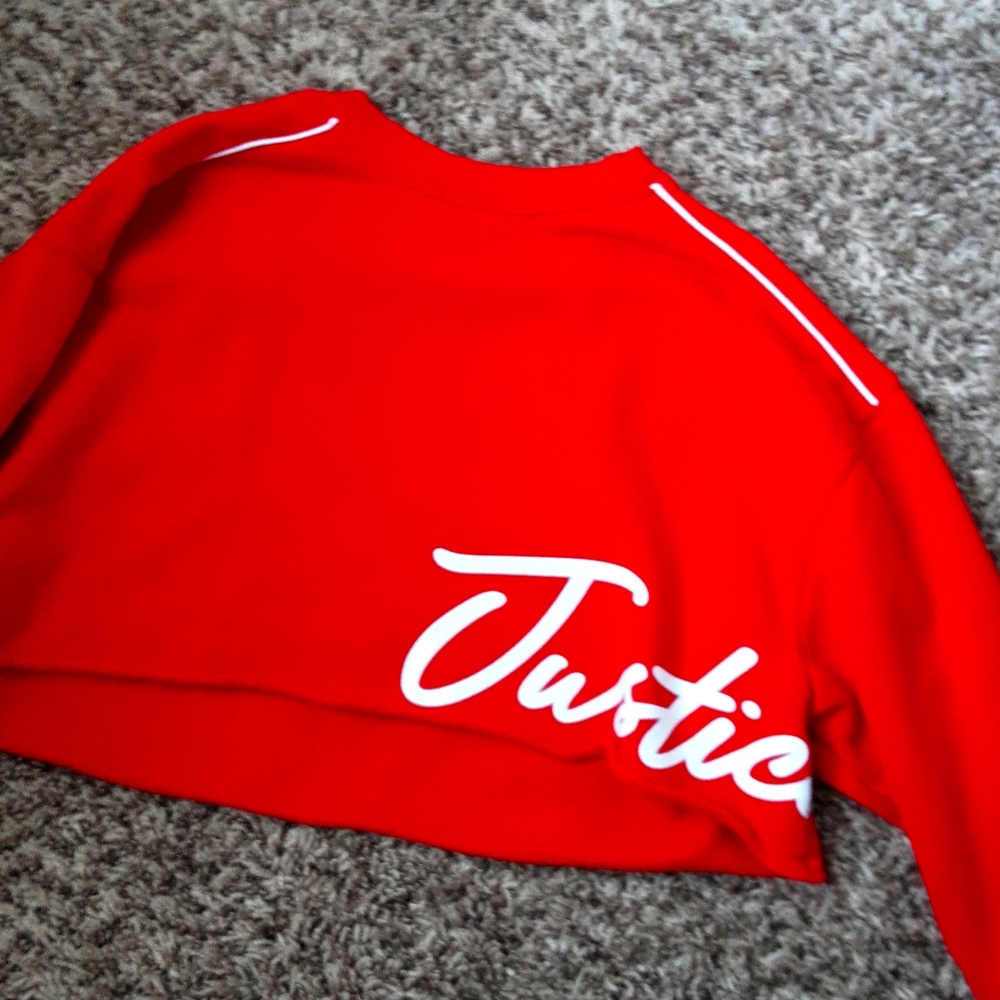 A cropped jacket or sweater